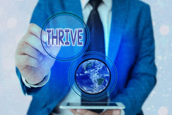 Woord schrijven tekst Thrive. Business concept for Think positively Blijven bloeien en bloeien Time to Blossom Elements of this image furnished by NASA. — Stockfoto