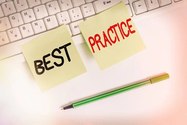Writing note showing Best Practice. Business photo showcasing commercial procedures that are accepted prescribed being correct Square green note paper with pencil on the white background.