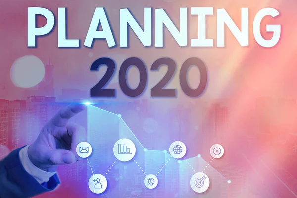 Schrijf notitie met de planning 2020. Zakelijke fotopresentatie proces van het maken van plannen voor iets volgend jaar. — Stockfoto