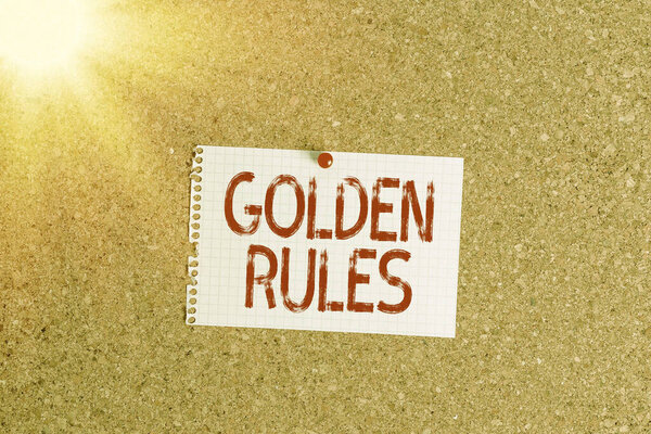 Word writing text Golden Rules. Business concept for Basic principle that should be followed Important Principle Corkboard color size paper pin thumbtack tack sheet billboard notice board.