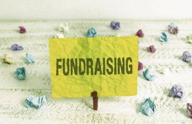 Bağış toplamayı gösteren kavramsal el yazısı. Hayır veya neden için mali destek oluşturmak isteyen Iş fotoğraf vitrin.