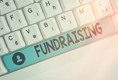 Bağış toplamayı gösteren bir metin işareti. Kavramsal fotoğraf hayır veya neden için mali destek oluşturmak isteyen.