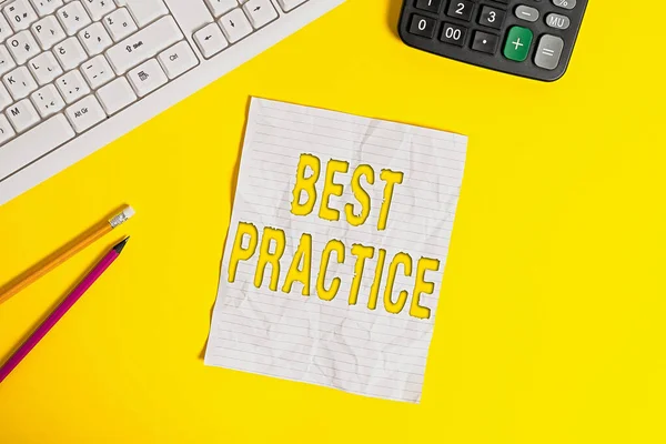 Writing note showing Best Practice. Business photo showcasing commercial procedures accepted prescribed being correct Copy space on notebook above yellow background with keyboard on table.
