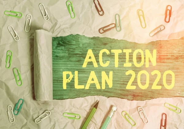 Writing note showing Action Plan 2020. Business photo showcasing proposed strategy or course of actions for current year.