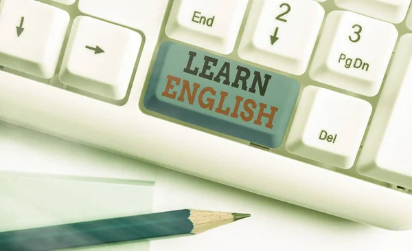 Texto para escrita de palavras Aprenda inglês. Conceito de negócio para ganho adquire conhecimento em nova língua por estudo . — Fotografia de Stock