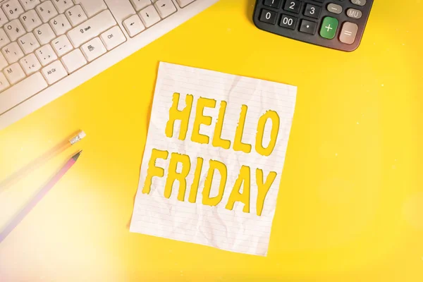 Writing note showing Hello Friday. Business photo showcasing used to express happiness from beginning of fresh week Copy space on notebook above yellow background with keyboard on table.