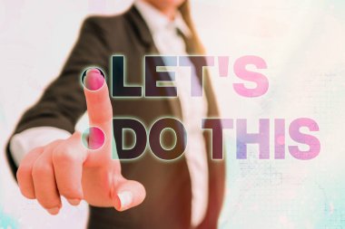 Let S Do This 'i gösteren bir not yazıyorum. İş fotoğrafında bir şey yapma konusunda anlaşmak ya da yapmak istediğin bir şey gösteriliyor..