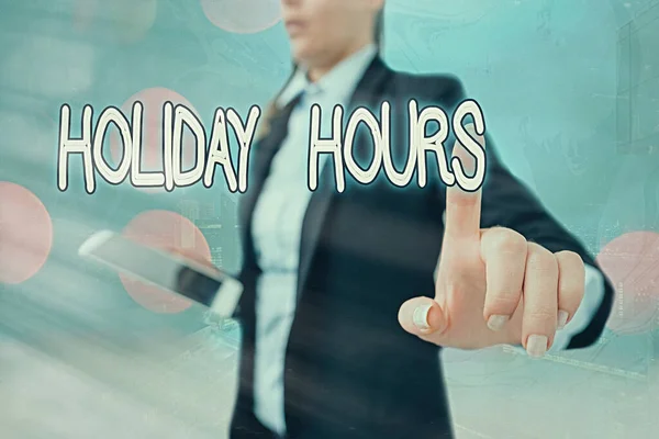 Writing note showing Holiday Hours. Business photo showcasing employee receives twice their normal pay for all hours. — Stock Photo, Image