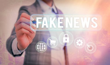 Sahte haberleri gösteren bir not yazıyorum. Sahte bilgi içeren iş fotoğrafı gerçek haber olma kisvesi altında yayınlandı.