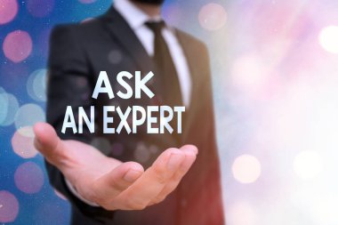 Ask An Expert 'ı gösteren kavramsal el yazısı. İş fotoğrafı metni, bir konuda yetenekli veya bilgili birine danışılır..
