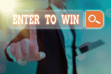 Enter To Win 'i gösteren kavramsal el yazısı. İş fotoğrafı metni ödül ya da kazanma şansı karşılığında bir şey takas ediyor.
