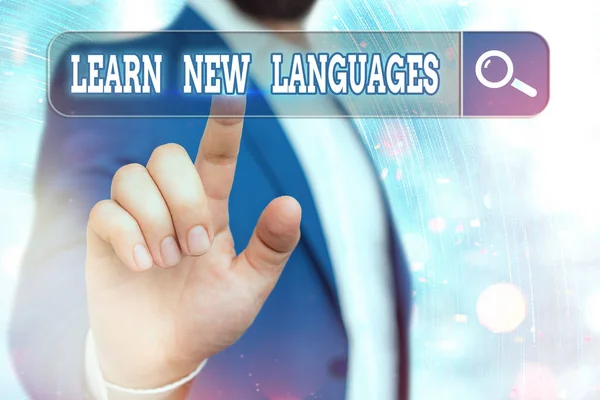 Escritura a mano de texto Aprender nuevos idiomas. Concepto que significa desarrollar la capacidad de comunicarse en lenguaje extranjero . — Foto de Stock