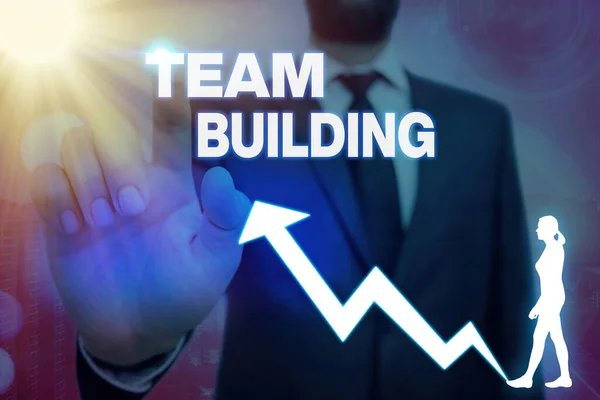 Psaní textu Team Building. Pojetí znamená různé druhy činností využívaných k posílení společenských vztahů. — Stock fotografie
