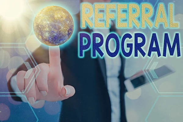 Handwriting text Referral Program. Concept meaning internal recruitment method employed by organizations Elements of this image furnished by NASA.