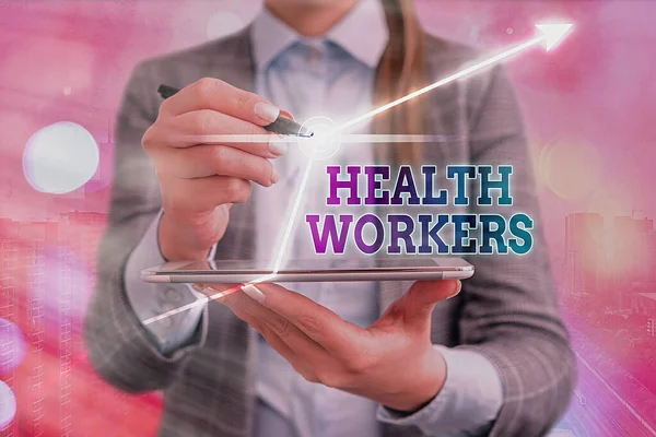 Sinal de texto mostrando Trabalhadores da Saúde. Foto conceitual cujo trabalho para proteger a saúde de suas comunidades . — Fotografia de Stock