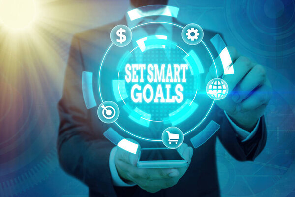 Word writing text Set Smart Goals. Business concept for giving criteria to guide in the setting of objectives.