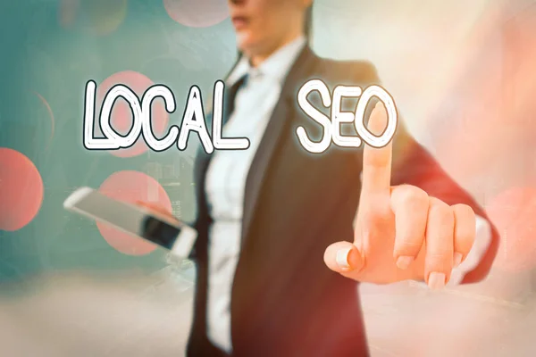 Writing note showing Local Seo. Business photo showcasing helps businesses promote products and services to local customers. — Stock Photo, Image