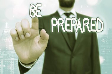 Be Prepared 'ı gösteren not yazılıyor. İş fotoğrafçılığı her zaman bir şeyi yapmaya ya da halletmeye hazır ol..