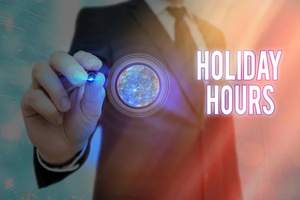 Word writing text Holiday Hours. Business concept for employee receives twice their normal pay for all hours Elements of this image furnished by NASA. — Stock Photo, Image