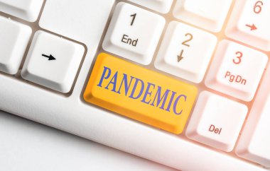 Salgını gösteren bir not yazıyorum. İş fotoğraflarının geniş bir alana yayılması nüfusun yüksek oranını etkiliyor.