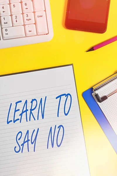 Conceptual hand writing showing Learn To Say No. Business photo showcasing decline or refuse few things before you destroy yourself Crumpled white paper on table clock mobile and pc keyboard. — Stock Photo, Image