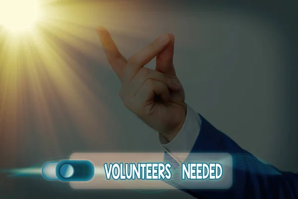 Text sign showing Volunteers Needed. Conceptual photo need work or help for organization without being paid. — Stock Photo, Image