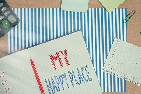 Text sign showing My Happy Place. Conceptual photo something nice has happened or they feel satisfied with life Striped paperboard notebook cardboard office study supplies chart paper.