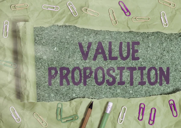 Käsiala tekstin kirjoittaminen Value Proposition. Käsitteen merkitys ominaisuus, jonka tarkoituksena on tehdä yrityksestä tai tuotteesta houkutteleva . — kuvapankkivalokuva