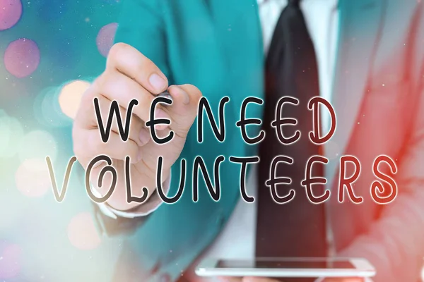 Texto para escrever palavras Precisamos de Voluntários. Conceito de negócio para alguém que trabalha sem ser pago por isso . — Fotografia de Stock
