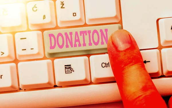 Escrevendo nota mostrando doação. Foto de negócios mostrando algo que é dado a uma instituição de caridade, especialmente uma soma de dinheiro . — Fotografia de Stock