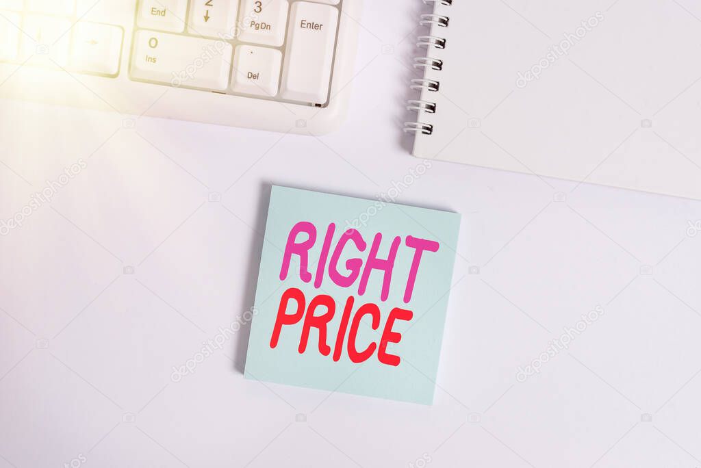 Handwriting text writing Right Price. Concept meaning the amount of money that it is reasonable for the product Empty note paper on the white background by the pc keyboard with copy space.