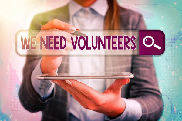 stock image Conceptual hand writing showing We Need Volunteers. Business photo showcasing someone who does work without being paid for it.