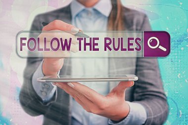 Conceptual hand writing showing Follow The Rules. Business photo showcasing go with regulations governing conduct or procedure. clipart