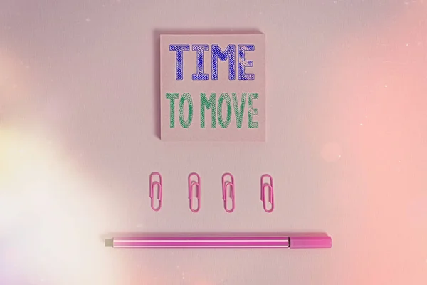 Word writing text Time To Move. Business concept for change in the same way or to reflect on what is current Colored blank sticky note clips binders gathered pen trendy cool background.