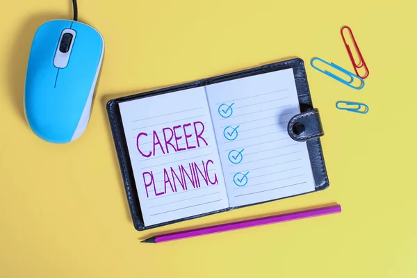 Writing note showing Career Planning. Business photo showcasing Strategically plan your career goals and work success Leather locked diary striped sheets marker mouse colored background.