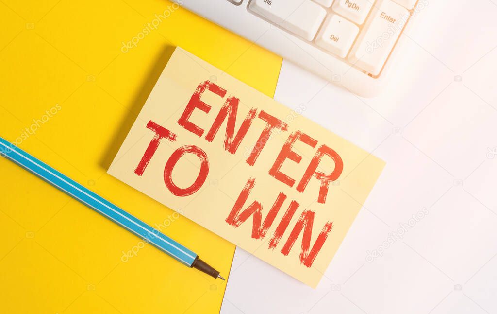 Conceptual hand writing showing Enter To Win. Business photo text exchanging something value for prize or chance of winning Paper with copy space and keyboard above orange background table.