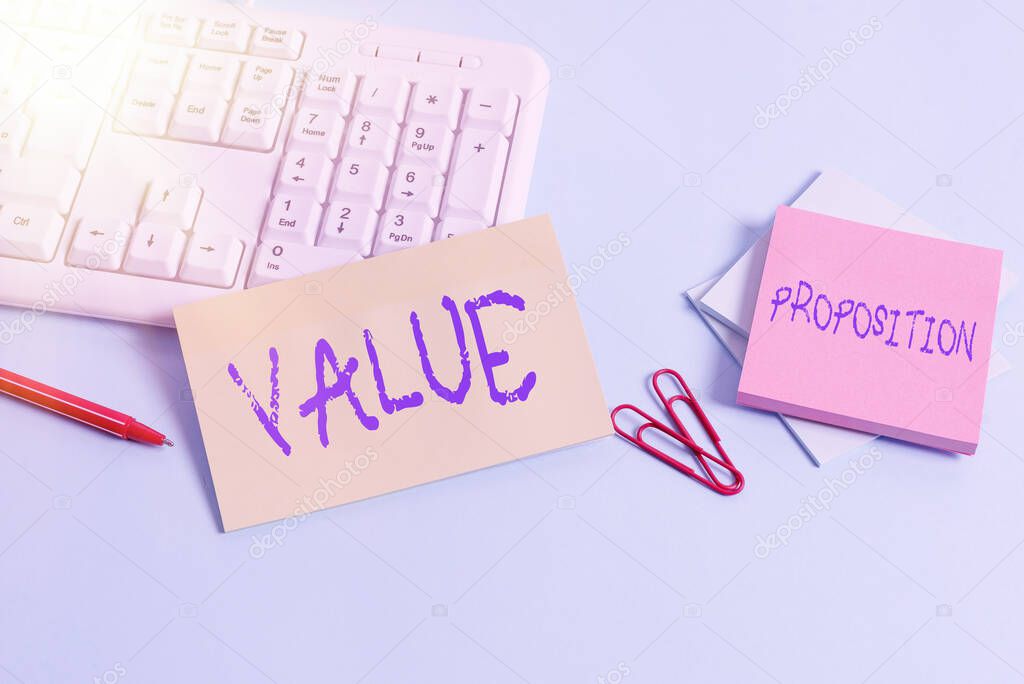 Writing note showing Value Proposition. Business photo showcasing feature intended to make a company or product attractive Paper blue keyboard office study notebook chart numbers memo.