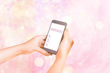 Belirtileri gösteren bir not yazıyorum. İş fotoğrafı gösterimi belirti ya da işaret olarak hizmet veriyor. Özellikle istenmeyen bir şeyin..