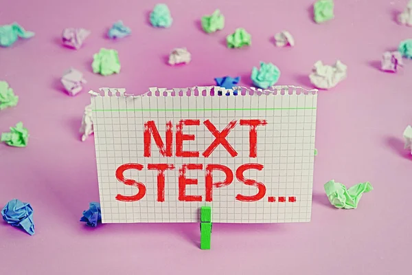 Χειρόγραφο κείμενο Επόμενα βήματα. Έννοια σημαίνει κάτι που κάνετε ή σχεδιάζετε αφού έχετε τελειώσει κάτι άλλο. — Φωτογραφία Αρχείου