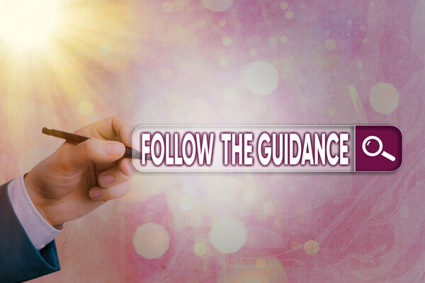 Conceptual hand writing showing Follow The Guidance. Business photo showcasing controlling a course of projectile by builtin mechanism.