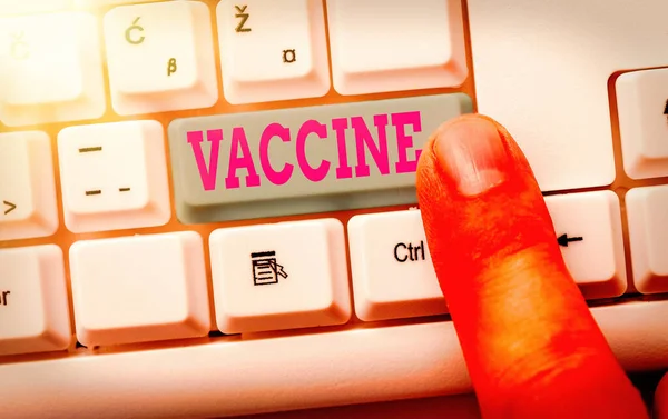 Schrijfbriefje met vaccin. Zakelijke foto presentatie voorbereiding van gedode micro-organismen of levende verzwakte organismen. — Stockfoto