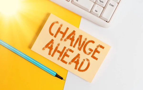 Conceptual hand writing showing Change Ahead. Business photo text to replace with or exchange for another Become different Paper with copy space and keyboard above orange background table. — Stock Photo, Image