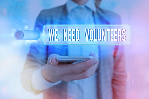 Text sign showing We Need Volunteers. Conceptual photo someone who does work without being paid for it. — Stock Photo, Image