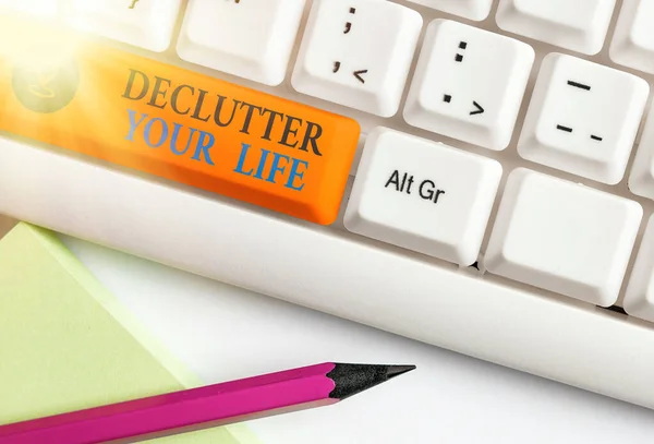 Escribir texto a mano Declutter Your Life. Concepto significado Para eliminar cosas extrañas o información en la vida . — Foto de Stock