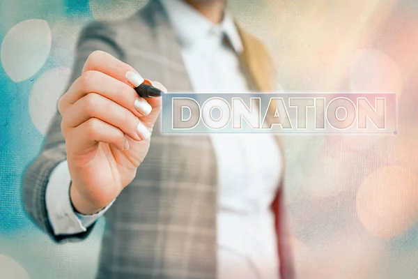 Texto escrito Doação. Conceito de negócio para algo que é dado a uma instituição de caridade, especialmente uma soma de dinheiro . — Fotografia de Stock