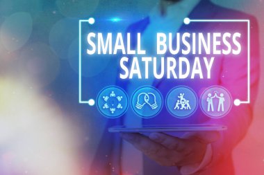 Cumartesi günü Küçük İşletme el yazısı. Konsept, cumartesi günü Amerikan alışveriş tatili anlamına geliyor..