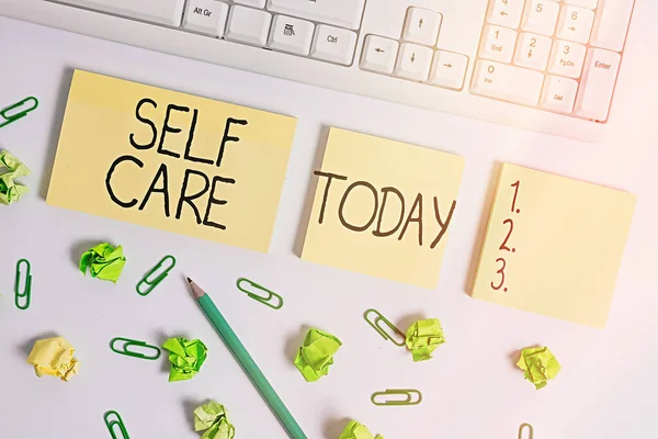 Word writing text Self Care. Business concept for the practice of taking action to improve one s is own health Flat lay above blank copy space sticky notes with business concept. — Stock Photo, Image
