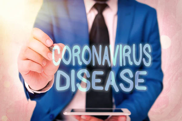 Слово писать текст Coronavirus Disease. Бизнес-концепция для определения болезни, вызванной новым вирусом SARSCoV2 . — стоковое фото