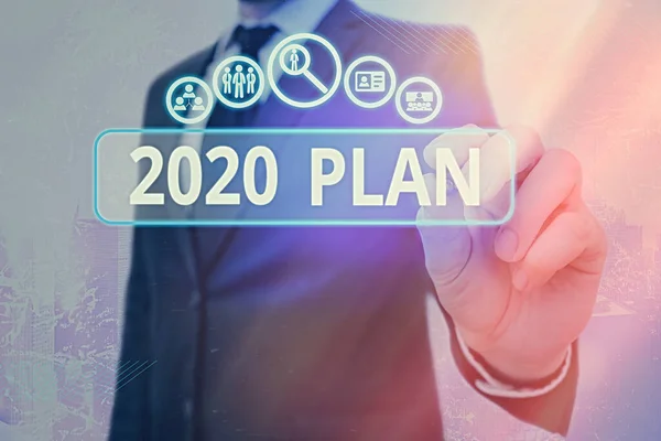 Написання нотатки, що показує план 2020 року. Ділова фотографія, що демонструє ваші цілі та плани на поточний рік або 2020 рік . — стокове фото
