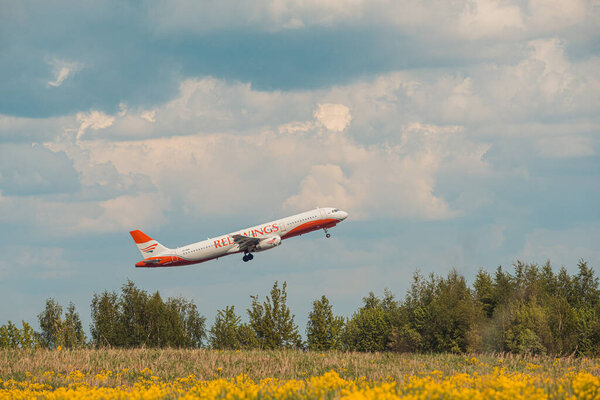Domodedovo, Russia - May 12, 2019: Red Wings Airbus A321-231 side number VP-BRB Airlines take off at Domodedovo airport, Moscow Region